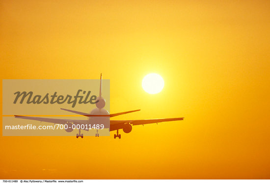 Aeroplane In Sunset