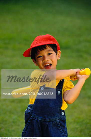 kid with baseball