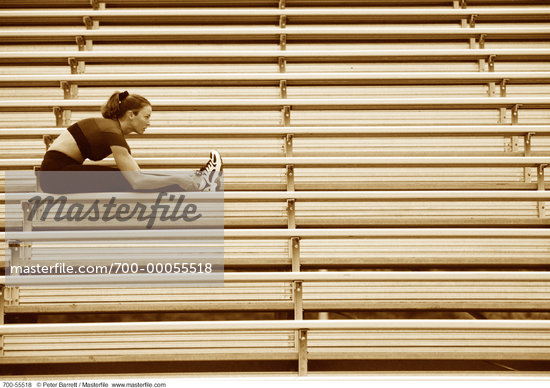 sitting on bleachers