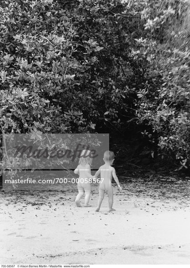 Back View of Nude Children Walking on Beach