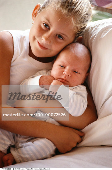 Sister Holding Baby