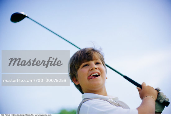 Boy Golfing