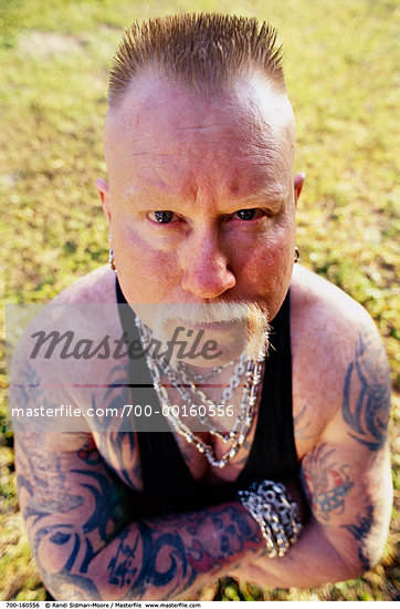 Portrait of a Man with Tattoos Stock Photo RightsManaged Artist Randi