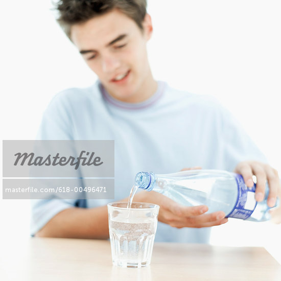 Boy Pouring Water