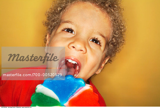 Child Eating Lollipop