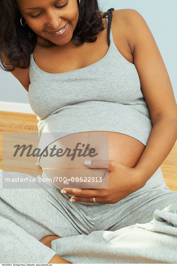 african american on laptop african american woman pre black and pregnant