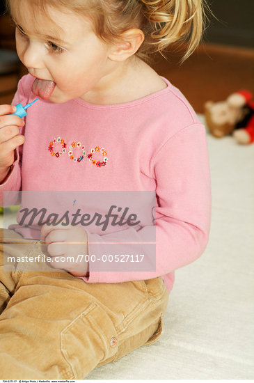 Girl Licking Nail Polish Brush Stock Photo RightsManaged Artist Artiga 