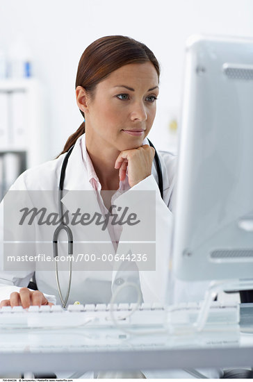 doctor with computer