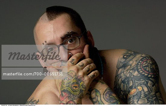 Portrait of Man With Tattoos Stock Photo RightsManaged Artist David