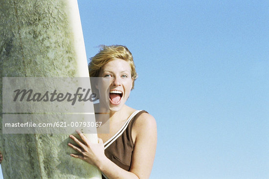 Girl Holding Surfboard