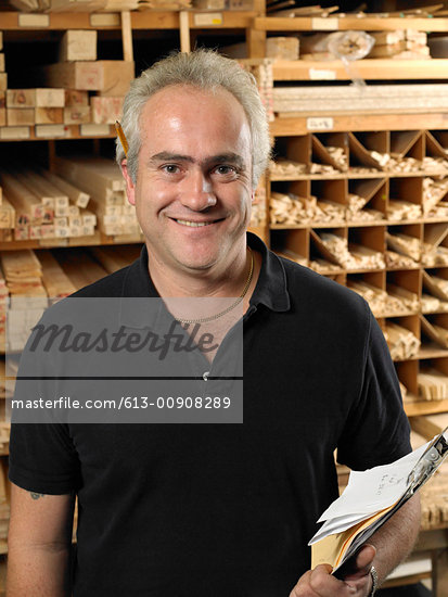 man holding wood