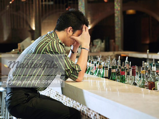 Man Sitting at Bar    Stock Photo - Royalty-Free, Artist: Masterfile, Code: 600-00909849