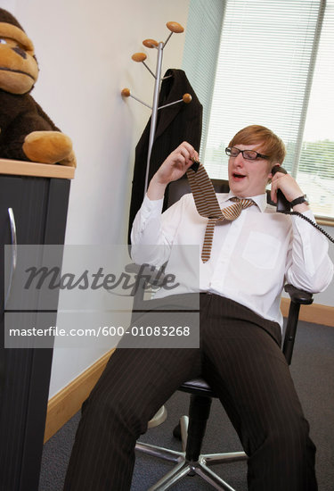 Businessman Yawning at Work    Stock Photo - Sin royalties, Artist: Masterfile, Code: 600-01083268