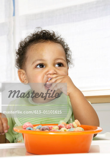 Babies Eating Cereal