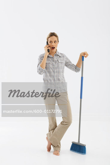holding broom