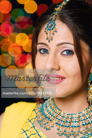 Portrait of a young woman wearing traditional Indian clothing