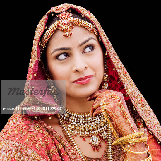 Closeup of a bride in a traditional wedding dress