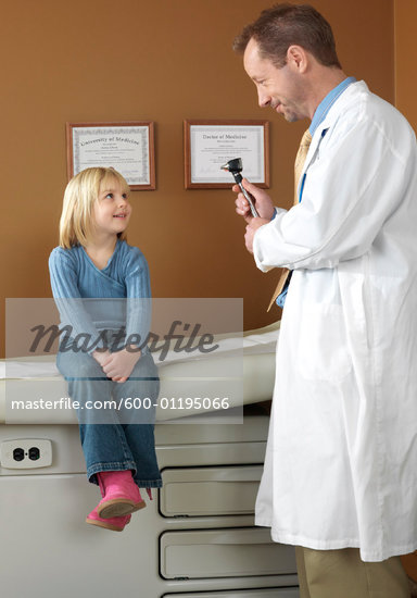 doctor examining female