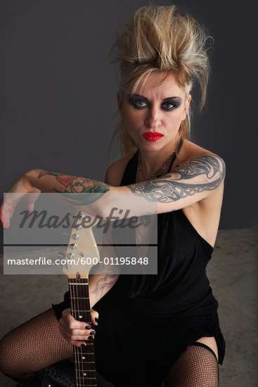 Portrait of Woman with Guitar Stock Photo RoyaltyFree Artist Masterfile