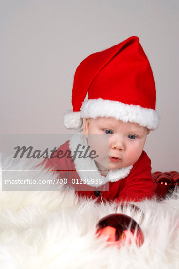 Portrait of Baby Wearing Santa Costume    Stock Photo - Rights-Managed, Artist: David Zuber, Code: 700-01235935
