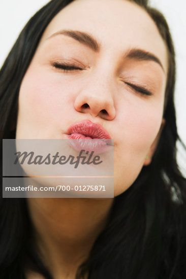 Woman Puckering Her Lips