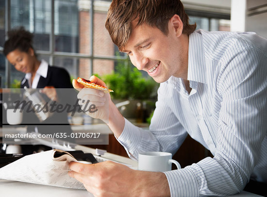 Man Eating Toast