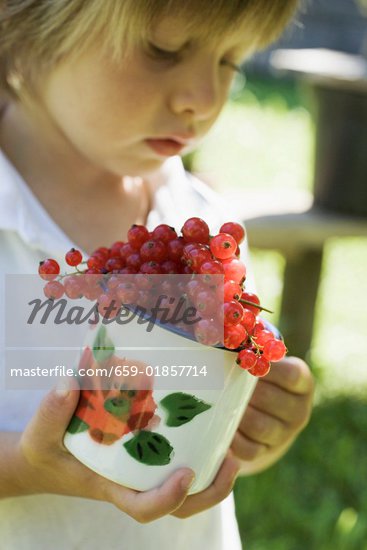 Child Holding Cup