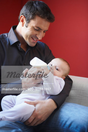 Dad Feeding Baby