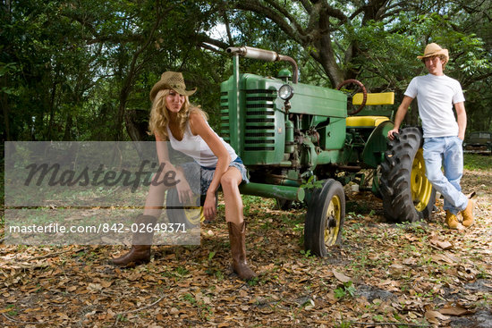 Cowgirl On Tractor