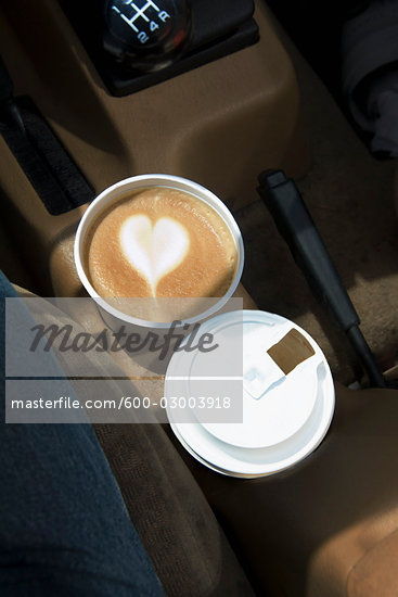 Two Coffees with Heart Design in Foam in Car Cup Holders Two Coffees with Heart Design in Foam in Car Cup Holders Stock Photo - Lizenzfrei (RF), Artist: Andrew Kolb , Code: 600-03003918