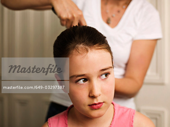 Girl Tying Hair