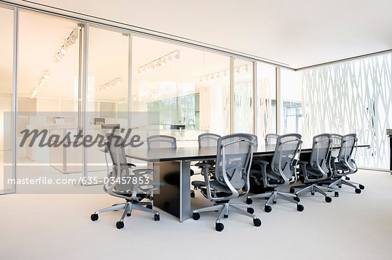 Empty, modern conference room with glass walls - Stock Photos
