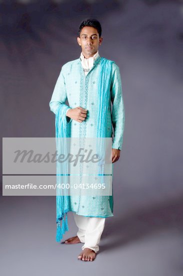 Bengali male wearing a light blue agua decorated Dhoti with shawl