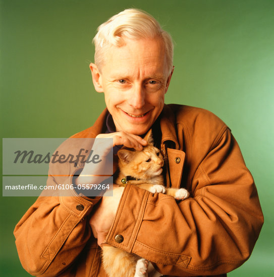 Man Holding Kitten