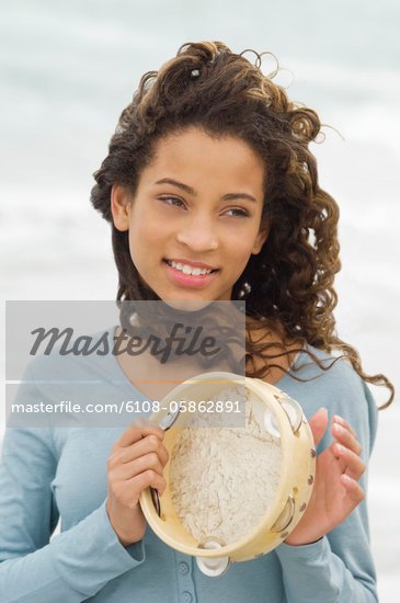 Girl Playing Tambourine