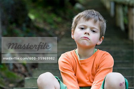  - 600-05969982em-Portrait-of-Boy-on-Steps