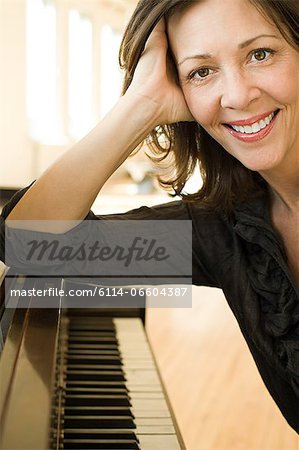 Woman at <b>her piano</b> - 6114-06604387em-Woman-at-her-piano