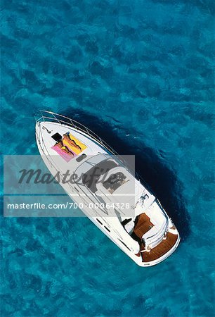 Overhead View of Women Tanning On Deck of Boat, Bahamas Stock Photo 