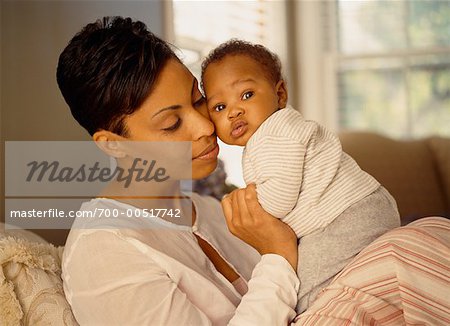  - 700-00517742em-Mother-in-Bed-with-Baby---