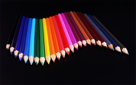 simsearch:400-04046903,k - Colorful pencils arranged in a wave isolated over black background Stock Photo - Budget Royalty-Free & Subscription, Code: 400-04009229