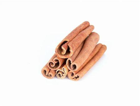 simsearch:628-02228100,k - Dry cinnamon sticks tower on a white background Stock Photo - Budget Royalty-Free & Subscription, Code: 400-04009220