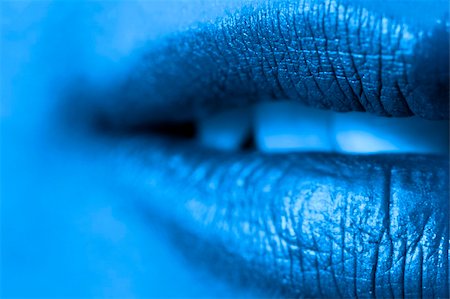 simsearch:400-04725812,k - Macro blur image of bright lips -gold lipstik Stock Photo - Budget Royalty-Free & Subscription, Code: 400-04000755