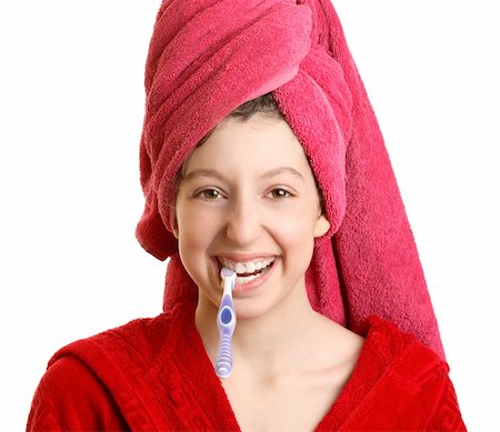 simsearch:400-04151135,k - The girl in a red dressing gown cleans a teeth Stock Photo - Budget Royalty-Free & Subscription, Code: 400-04000856