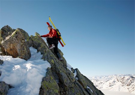 simsearch:400-05118687,k - Male ski-climber climbing a rocky ridge; copy-space on the right. Italian alps. Stock Photo - Budget Royalty-Free & Subscription, Code: 400-04000882