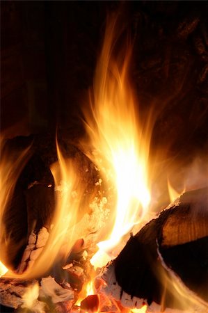 simsearch:614-03763965,k - An open log fire on a glowing hot bed of coals. Stock Photo - Budget Royalty-Free & Subscription, Code: 400-04015234