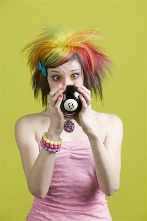 simsearch:400-04016564,k - Close-up of a woman with bright mascara and colorful hair predicts the future Stock Photo - Budget Royalty-Free & Subscription, Code: 400-04015838