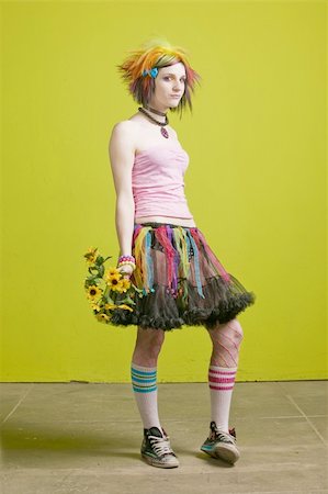 simsearch:400-04016564,k - Pretty young woman with colorful punk clothes with plastic flowers. Stock Photo - Budget Royalty-Free & Subscription, Code: 400-04015918