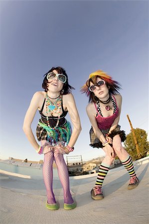 simsearch:400-04016564,k - Fisheye shot of girls in brightly colored clothing on a roof Stock Photo - Budget Royalty-Free & Subscription, Code: 400-04015920