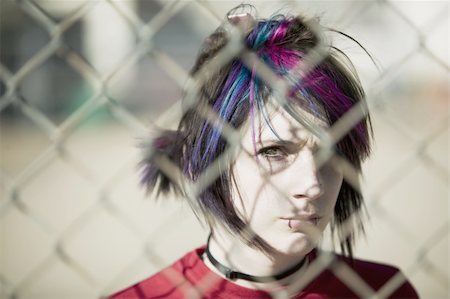 running away scared - Young Punk Girl Being Shadowed By Chain Link Stock Photo - Budget Royalty-Free & Subscription, Code: 400-04016564