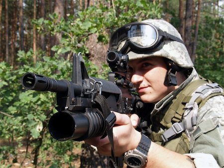 simsearch:400-04072400,k - Soldier in ACU aiming his Colt M4 with M203 grenade launcer Stock Photo - Budget Royalty-Free & Subscription, Code: 400-04017208